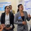 students presenting poster